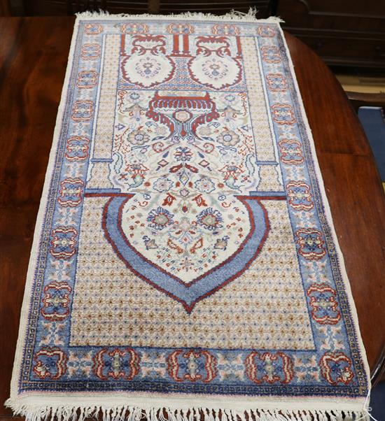 A Tunisian Persian style silk mat 100 x 52cm